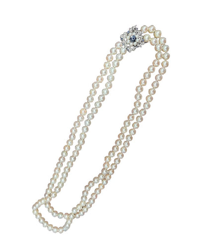 Collier Magnifique collier de perles à double rang 58 Facettes