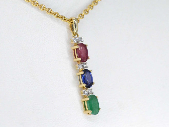 Pendentif Pendentif en or jaune avec pierres précieuses multicolores et diamants 58 Facettes 2277