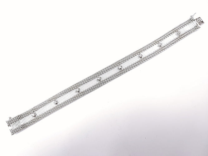 Bracelet Bracelet ruban or blanc et diamants 1950-1960 58 Facettes BRA.RUBAN.B.1333