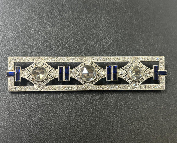 Broche Broche Art Déco en platine avec diamants taille rose et saphirs calibrés 58 Facettes