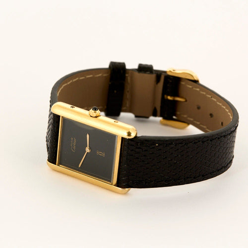 Montre Cartier - Montre Modèle "Tank Must" en argent, plaqué or et cadran noir. 58 Facettes