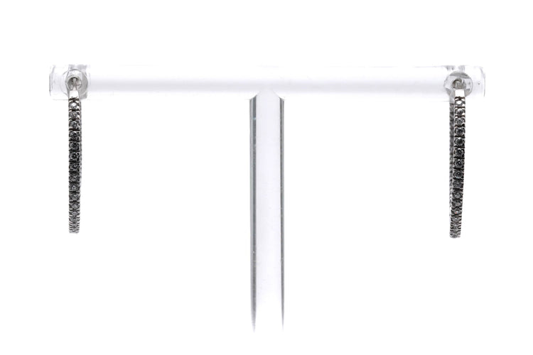 Boucles d'oreilles Créoles contemporaines en or blanc 18 carats serties de diamants taille brillant 0,64 ct 58 Facettes 23087