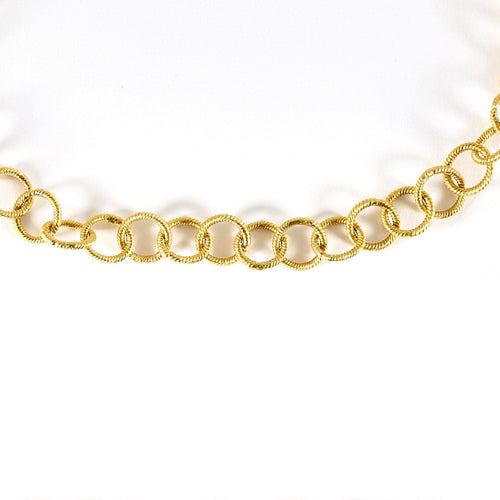 Collier Sautoir en or jaune à maillons ronds entrelacés 58 Facettes CLA0761