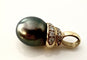 Pendentif Pendentif en or jaune, perle de tahiti et diamants 58 Facettes AB356