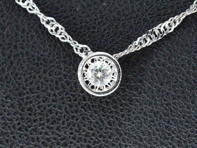 Pendentif Pendentif en or blanc avec un diamant taille brillant 58 Facettes 2089