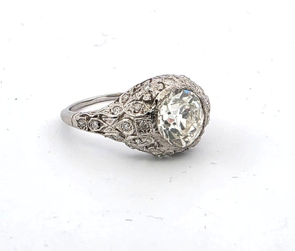 Bague 55 Bague Art Déco en platine avec un diamant central de 2,50 carats de taille ancienne. 58 Facettes
