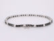 Bracelet Bracelet de tennis en or blanc serti de diamants noirs et blancs 58 Facettes 2119