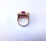 Tank ring set with baguette rubies in 18k rose gold 