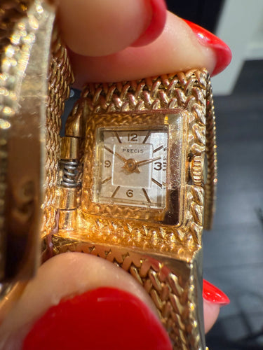 Montre Bracelet Montre Ruban Tressé - Or jaune et Diamants 58 Facettes 1.0000912/1