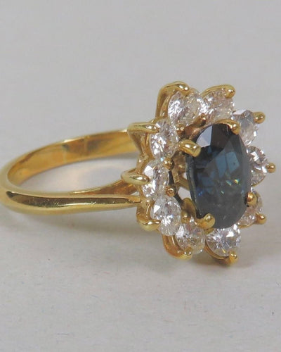 Bague 52 Bague Marguerite or jaune, saphir et diamants 58 Facettes