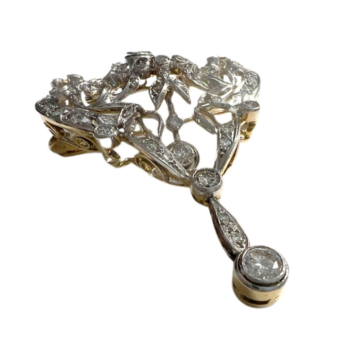 Principle of gold and platinum brooch with diamonds