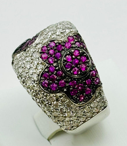 Bague Bague en or ornée de motifs floraux composés de diamants et de rubis 58 Facettes 50166