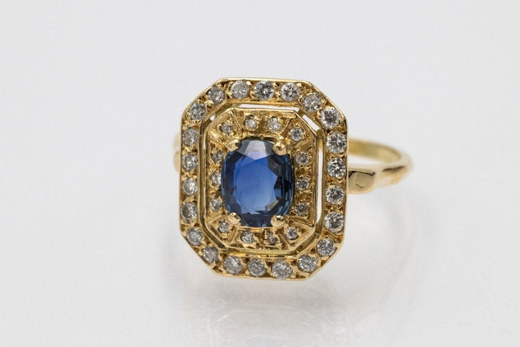 Unique yellow gold ring with an oval sapphire and diamonds 58 Facettes 11262