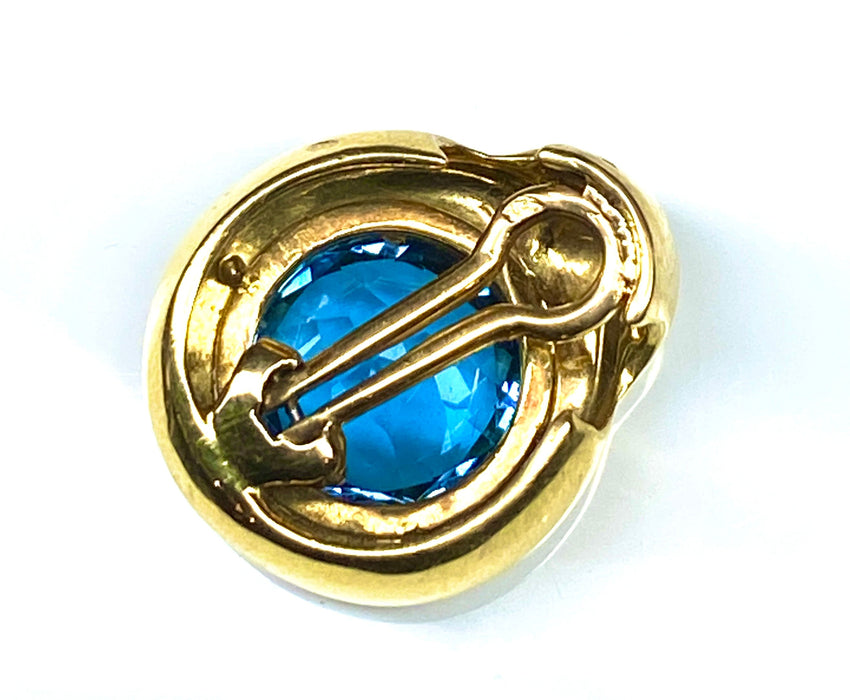 Yellow gold and blue topaz pendant