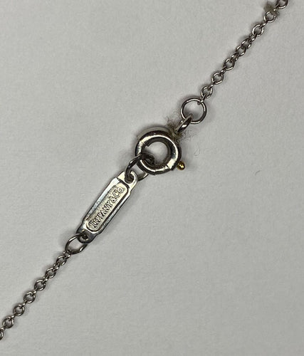 Collier Tiffany & Co - Collier trèfle platine et diamants 58 Facettes 250172