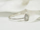 Bague Solitaire en or blanc et diamants en forme de poire 58 Facettes 24978