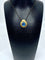 Pendentif Pendentif en or jaune et topaze bleue 58 Facettes AB355