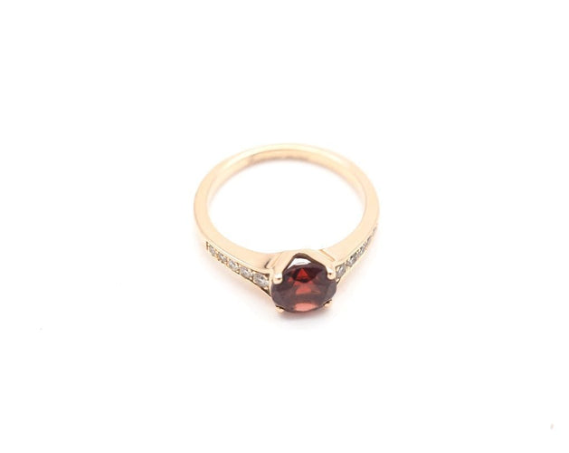 Bague 56 Bague or rose, grenat et diamants 58 Facettes