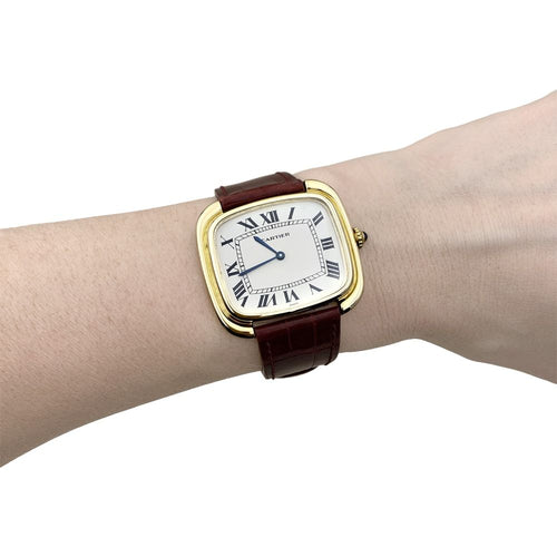 Uhr Cartier, „Square“ aus Gelbgold und Leder. 