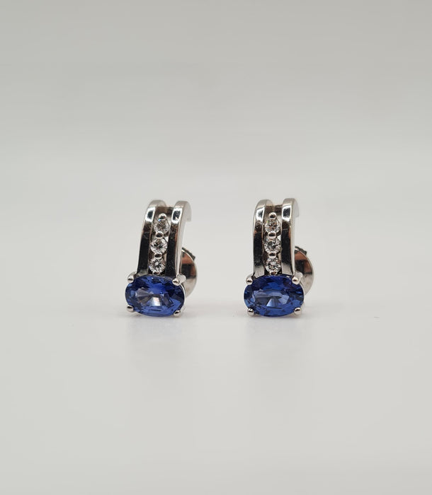 White gold earrings set with sapphires and diamonds