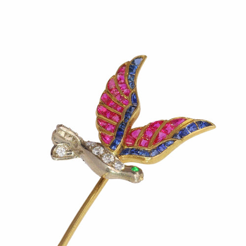 Broche Épingle à cravate vintage d'inspiration Art déco représentant un oiseau en vol avec des pierres précieuses multicolores 58 Facettes 24204-0272