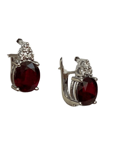 Boucles d'oreilles Boucles d'oreilles puces exquises en or blanc, serties d'un rubis rouge de 4,32 carats et de diamants 58 Facettes
