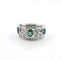 Bague Bague en or blanc des années 1970 avec émeraudes et diamants 58 Facettes