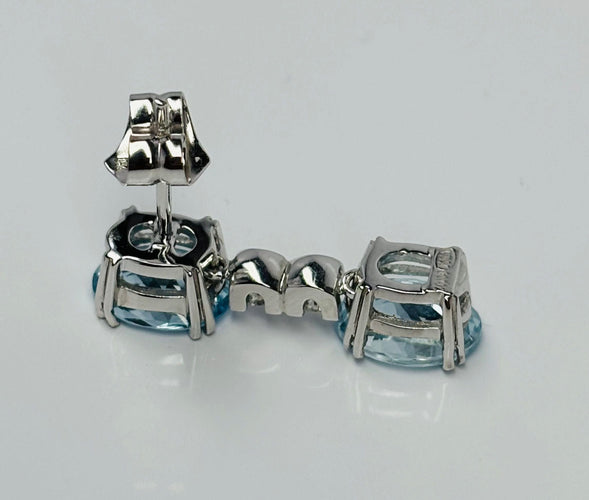 Boucles d'oreilles Boucles d'oreilles contemporaines en or blanc serties d'aigues-marines de 6,05 ct et de diamants de 0,20 ct 58 Facettes Q251B