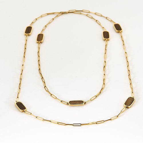 Collier DINH VAN - Rare sautoir de la collection Impression en or jaune et bois d'Amourette 58 Facettes LOR3480