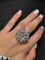 Bague 63 Bague fleur MATY or blanc diamants, améthystes et tourmalines 58 Facettes 1063
