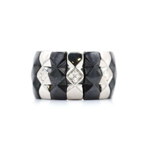 Bague Bague Enigma en or et acier 58 Facettes 8611