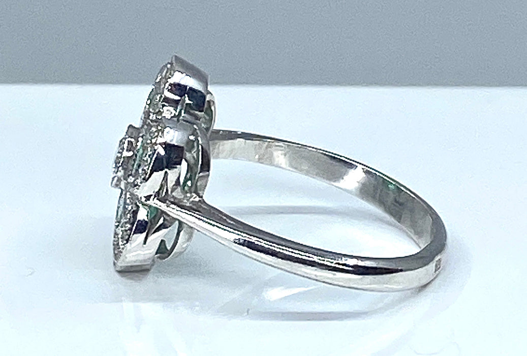 White gold, emerald and diamond ring