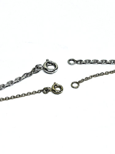 Collier Chaîne maille forçat en or blanc 18 carats 58 Facettes