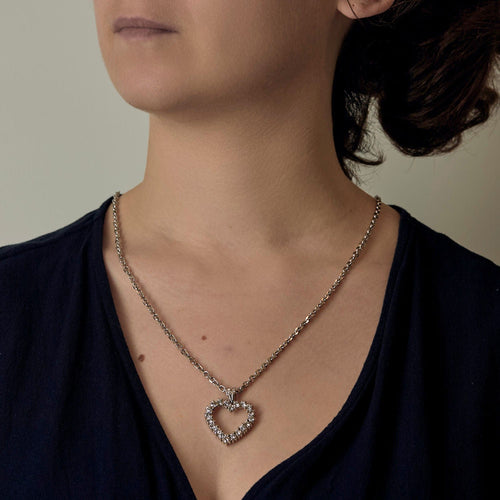 Collier Collier et pendentif "Coeur" en or gris et diamants 58 Facettes COMP1307