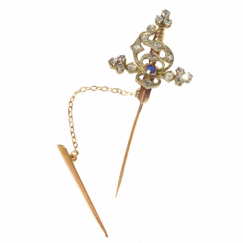 Broche Broche vintage en forme d'épée sertie de diamants et d'un saphir 58 Facettes 21309-0733