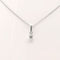 Collier Collier en or blanc serti d'un diamant de 0.15 carat 58 Facettes