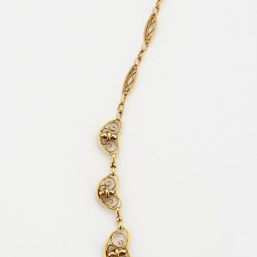 Collier Collier vintage filigrane en or jaune 58 Facettes