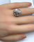 Bague Importante bague marguerite en or 18 carats et diamants 58 Facettes AB338