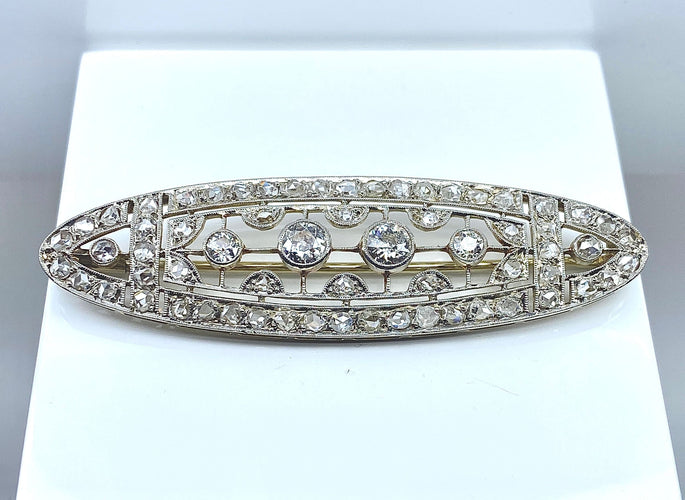 Broche Broche ajourée en or blanc 18 carats et platine, diamants 2 carats 58 Facettes AB668