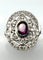 Bague 53 Bague Art Déco en platine sertie de rubis et de diamants (1,52 ct), ornée d'un motif en grappe. 58 Facettes Q407B