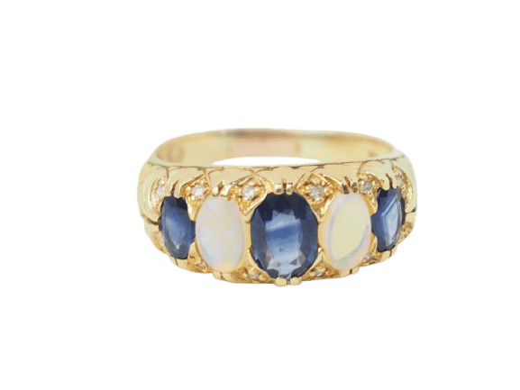 Bague 56.5 Bague jarretière en or jaune, saphirs et pierres de lune 58 Facettes 33246