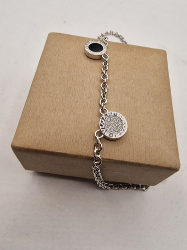 Collier Bvlgari - Collier Bvlgari Bvlgari double face pavé de diamants et onyx en or blanc 18k 58 Facettes