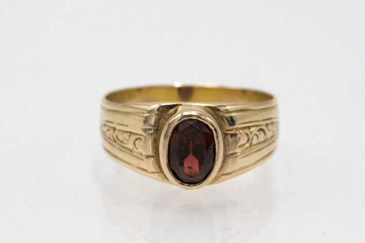 Unique yellow gold ring with a garnet, turn of the 19th/20th century 58 Facettes 11244