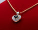 Pendentif Pendentif coeur or bicolore, saphirs, diamants 58 Facettes 250253