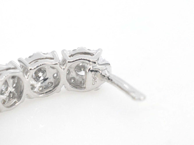 Boucles d'oreilles Boucles d'oreilles créoles en or blanc avec cinq chatons et diamants 58 Facettes 2111