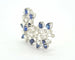 Broche Broche en or blanc sertie de diamants et de saphirs naturels 58 Facettes 8226