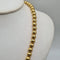 Collier Collier boules or jaune 18 carats 58 Facettes