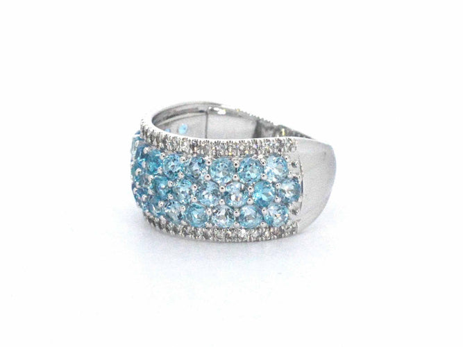 Bague 54 Bague en or blanc avec topazes et diamants 58 Facettes 2356