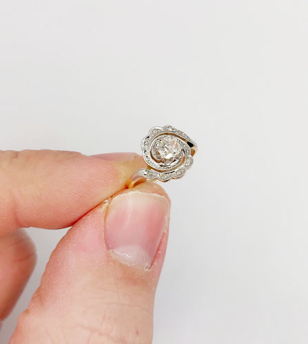 Bague 43 Bague tourbillon antique en or 18k et platine, diamant ancien 0,30 ct et roses 58 Facettes A06352