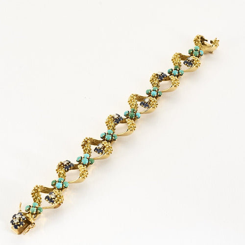 Bracelet Bracelet en or jaune, turquoises, saphirs et diamants 58 Facettes BIA1187